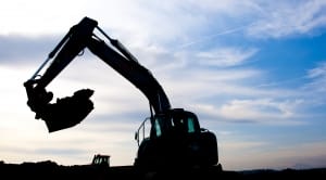 Excavator on Construction Site – Asbestos Exposure Risk - Ferraro Law Firm excavator crane at construction site