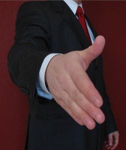 businessman-handshake - Ferraro Law Firm