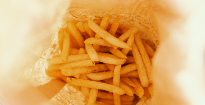 McDonald’s French Fries in Takeout Bag - Ferraro Law Firm bag of fast food fries
